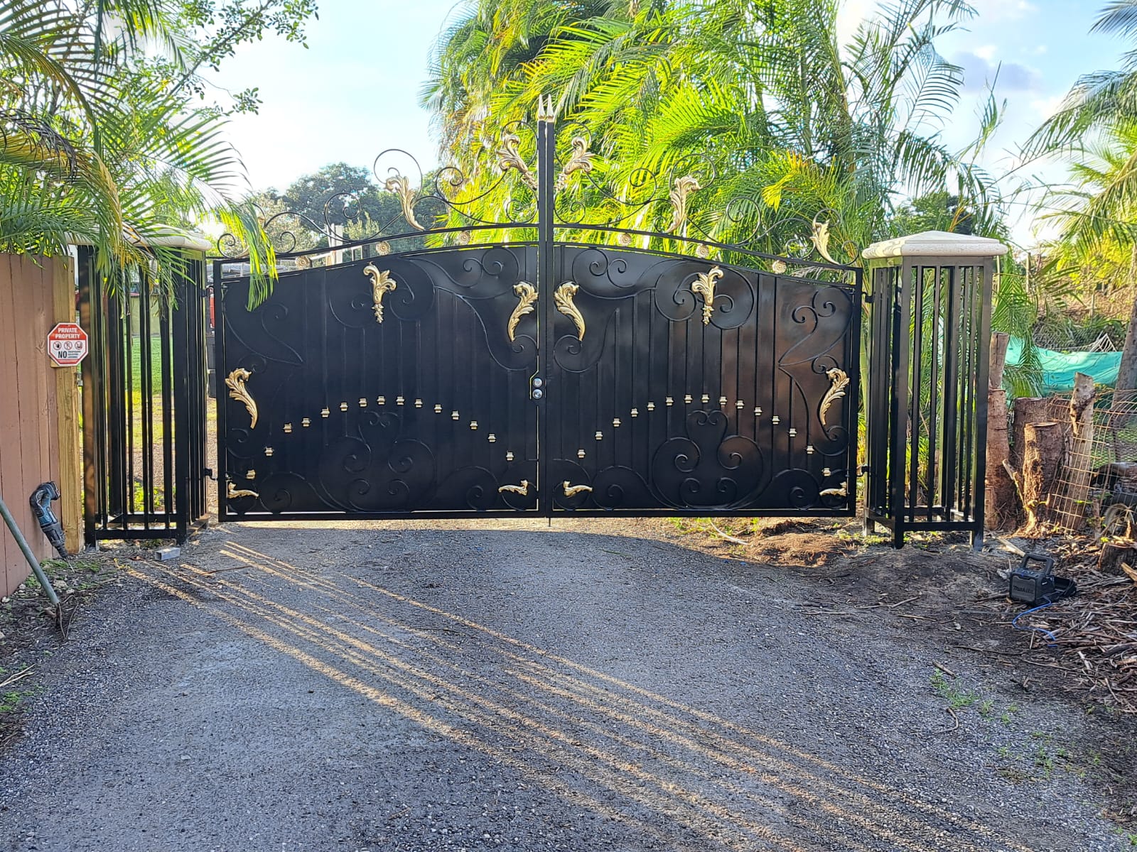 Decorative aluminum double entrance gate in Southwest Ranches